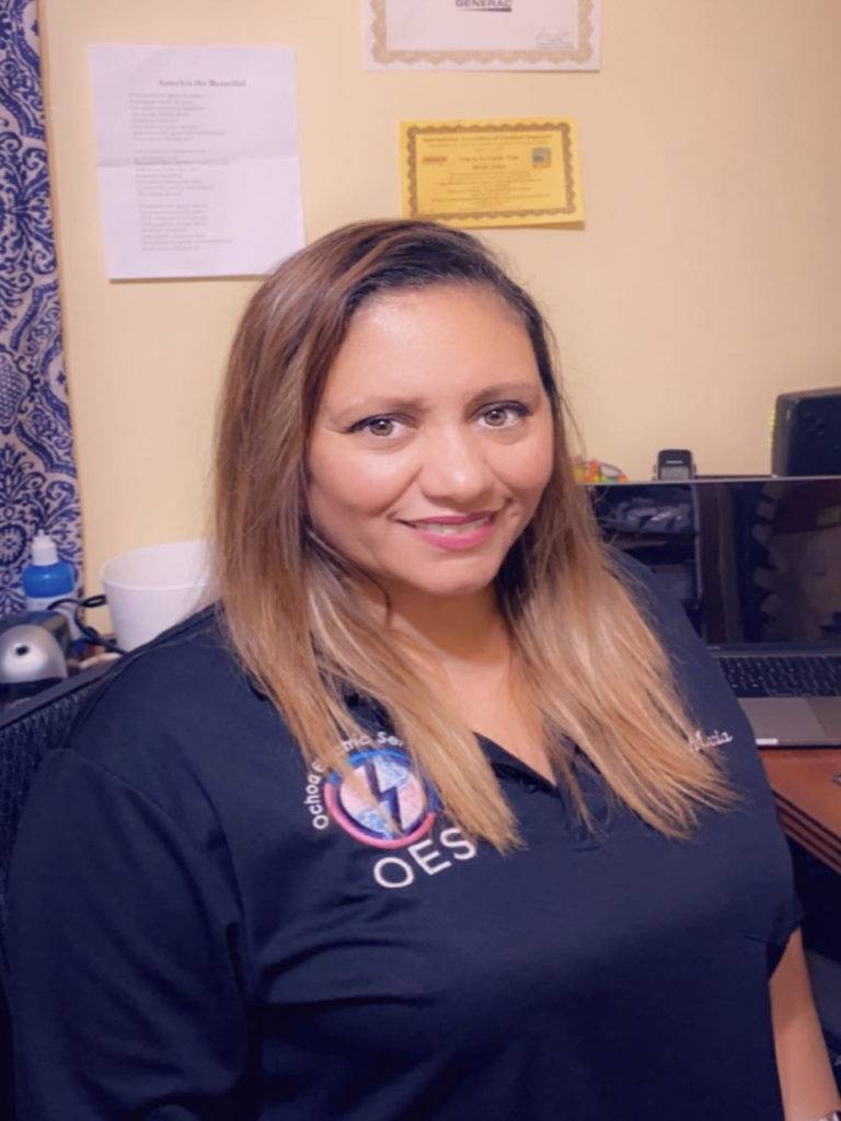 Maria, the Office Manager at Ochoa Electric Services, delivering local customer support for electrical services in Palm Beach County.